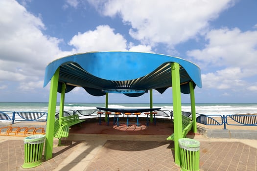 Canopy for protection from the hot sun in a city park. photo