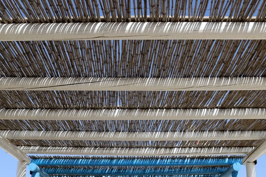Canopy for protection from the hot sun in a city park. photo