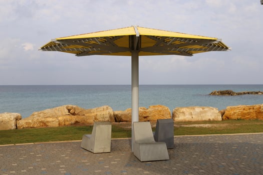 Canopy for protection from the hot sun in a city park. photo
