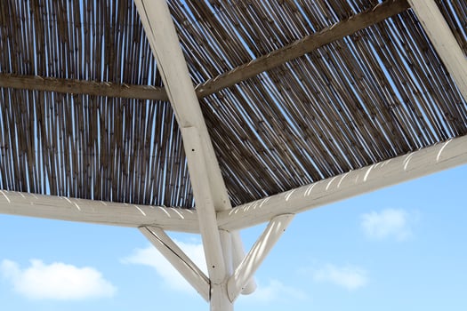 Canopy for protection from the hot sun in a city park. photo