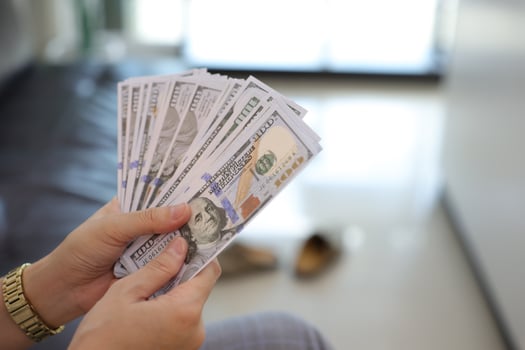 Money dollar bill with hand photo