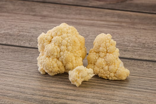 Raw white cauliflower cabbage heap photo