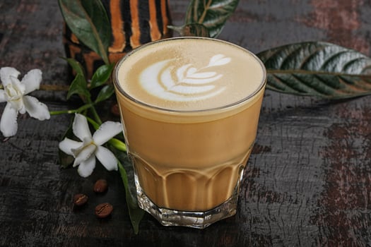 Hot cappuccino coffee in the glass photo