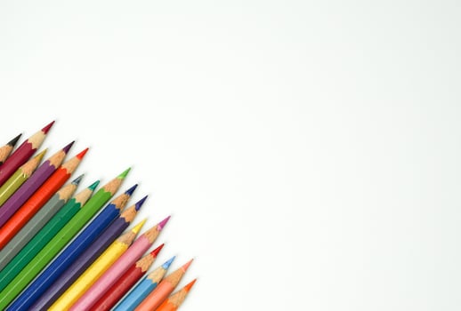 Colored pencil on white background. photo