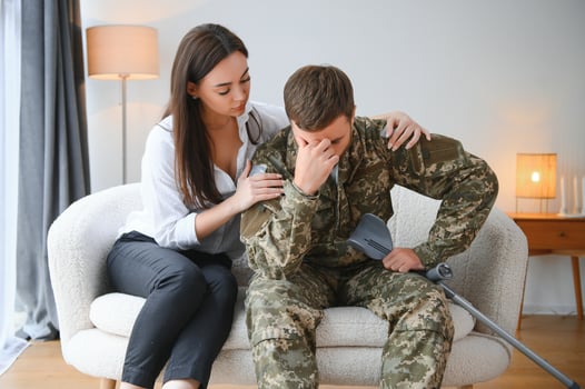 Psychologist supporting military officer in office photo