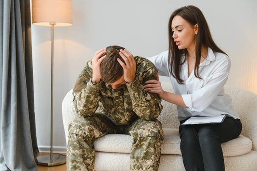 Therapy, support and military man with psychologist talking about ptsd. photo