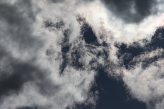 Cloudscape scenery, overcast weather above dark blue sky. Storm clouds floating in a rainy dull day with natural light. White and grey scenic environment background. Nature view. photo
