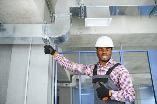 ventilation system installation and repair service. hvac technician at work. banner copy space photo