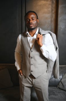 Successful confident black business man in a classic suit photo