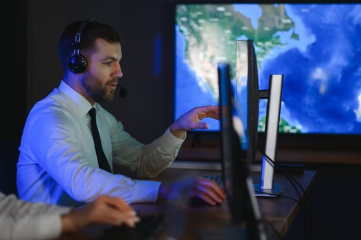 Diverse call center operators team use computers consulting clients in office photo