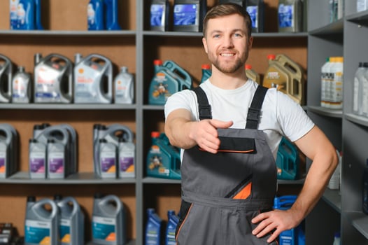 Smiling Salesman Auto Parts Store photo