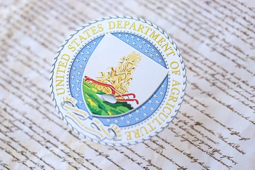 KYIV, UKRAINE - MARCH 9, 2024 US Department of Agriculture seal on United States Constitution photo