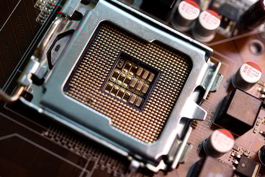 Microprocessor and socket on the motherboard. Computer radio components. Microchips and chips. photo
