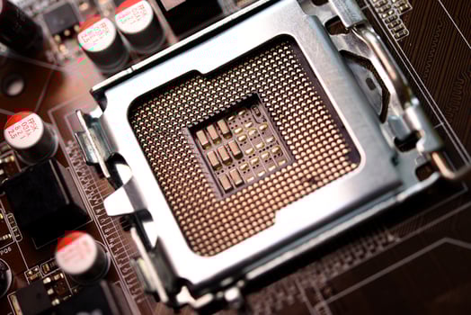 Microprocessor and socket on the motherboard. Computer radio components. Microchips and chips. photo