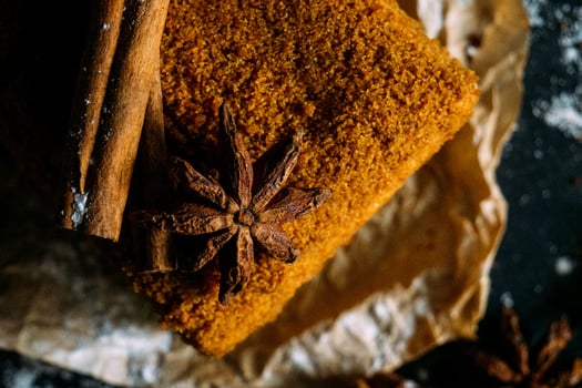 a cake with cinnamon and star anise on top photo