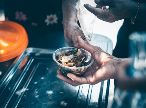 Donating food to fellow human beings is a concept of sharing. photo