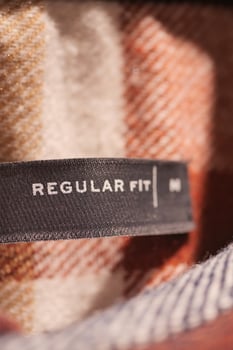 label tag regular fit on a men shirt photo