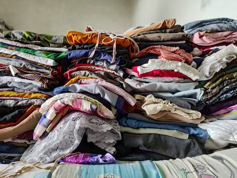 low angle view of household clothes arranged in a pile photo
