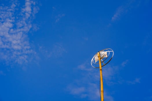 Landscape Photography. Landscape View. TV antenna with bamboo pole. A TV antenna with a blue sky background. Bandung, Indonesia photo