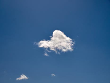 White fluffy clouds in the sky background. Cumulus clouds photo