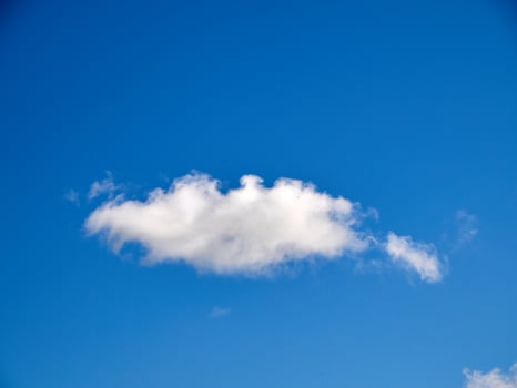 White fluffy clouds in the sky background. Cumulus clouds photo