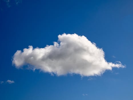 Cumulus clouds in the sky. Fluffy cloud shapes photo