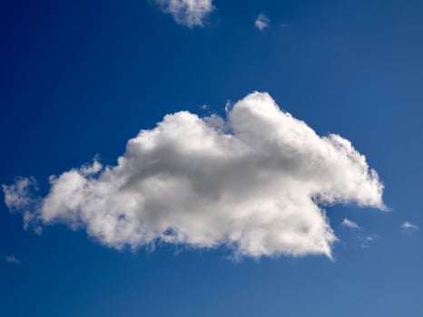 Cumulus clouds in the sky. Fluffy cloud shapes photo