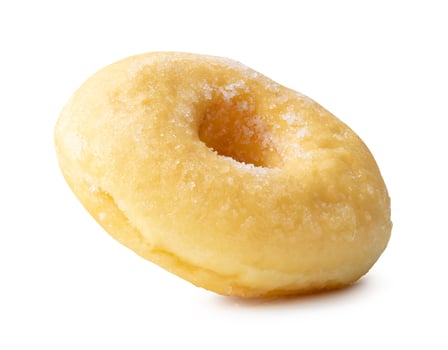 Side view of single sugar glazed cinnamon donut isolated on white background with clipping path photo
