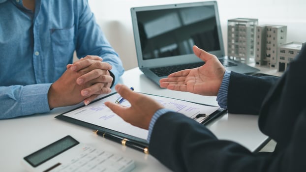 Real estate agents are selling real estate clients and offering condominiums buyers as long term rental investments help reduce burden paying installments. Investment property trading long term rental photo