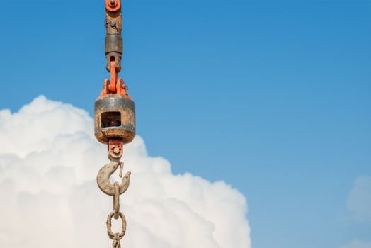 Construction crane With a blue sky background photo