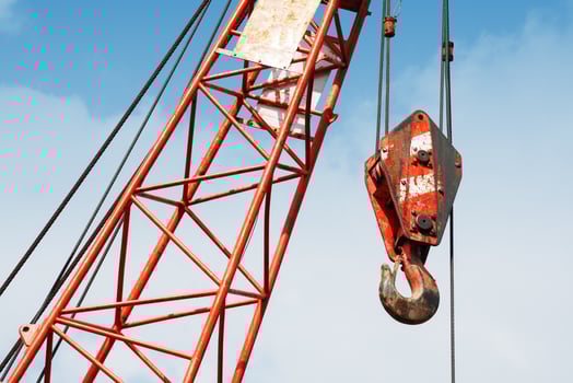 Construction crane With a blue sky background photo