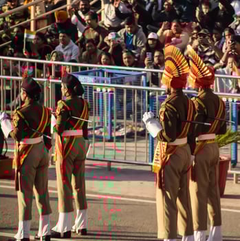 Wagah Border, Amritsar, Punjab, India, 02 February 2024 - Flag ceremony by Border Security Force BSF guards at India-Pakistan border near Attari Amritsar, Punjab, India held every day evening time photo