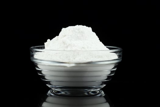 Protein powder in a transparent bowl photo