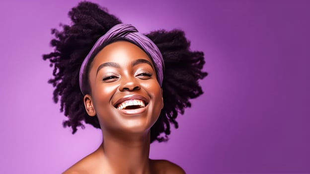 a cheerful mature African woman in a headscarf stands against a purple wall. photo