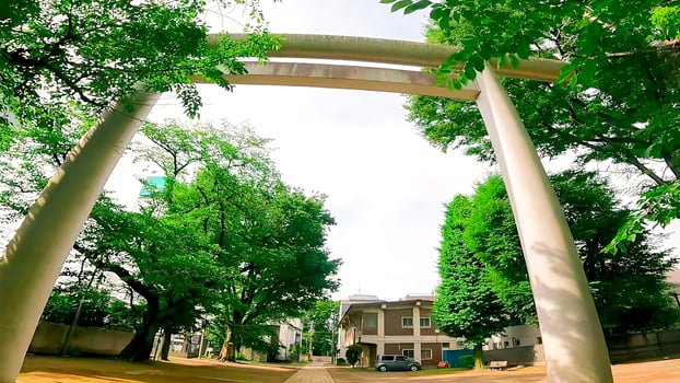 Shrine torii standing in a vacant lot Kamimachi Tenso Shrine,, a shrine in Setagaya, Tokyo, Japan Adjacent to a park, it is located in the back of a clean space. photo