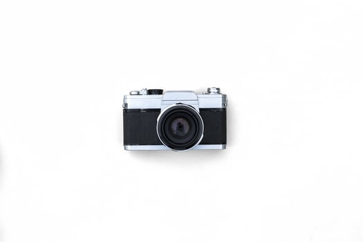 vintage film camera slr on white photo