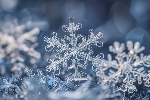 A snowflake under a microscope in the shape of a six-pointed star. photo