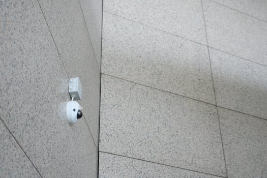 CCTV security camera operating outdoor photo