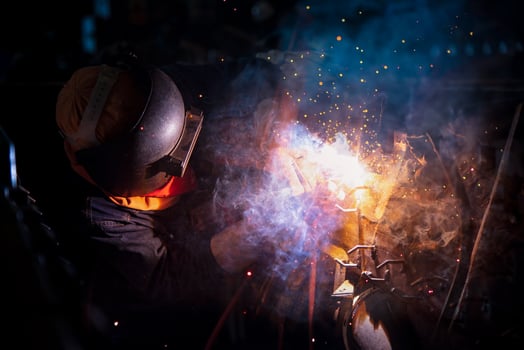 Welding steel structures and bright sparks in steel construction industry. photo