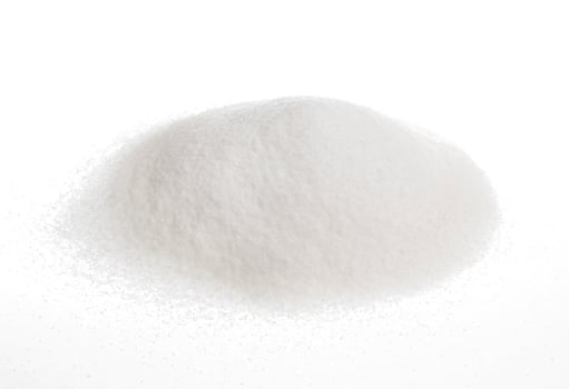 Pile of sugar isolated on white photo