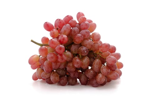 fresh red grapes isolated on a white background photo