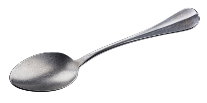 Metal spoon isolated on white background photo