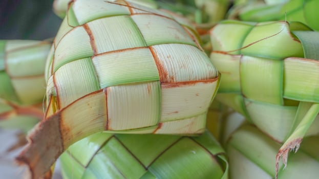Ketupat or rice dumpling is indonesian traditional food serve on Eid photo