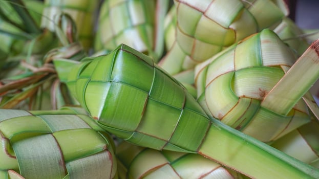 Ketupat or rice dumpling is indonesian traditional food serve on Eid photo