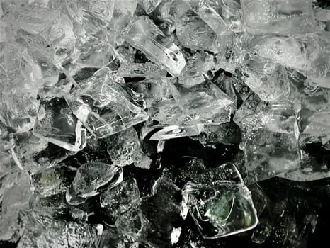 icecubes background,icecubes texture,icecubes wallpaper,ice helps to feel refreshed and cool water from the icecubes helps the water refresh your life and feel good.ice drinks for refreshment business photo