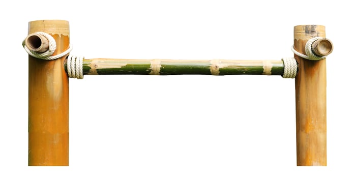 Bamboo frame tied with white rope on the corner isolated on white background photo