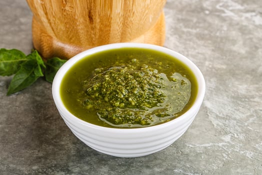Homemade vegetarian basil pesto sauce photo