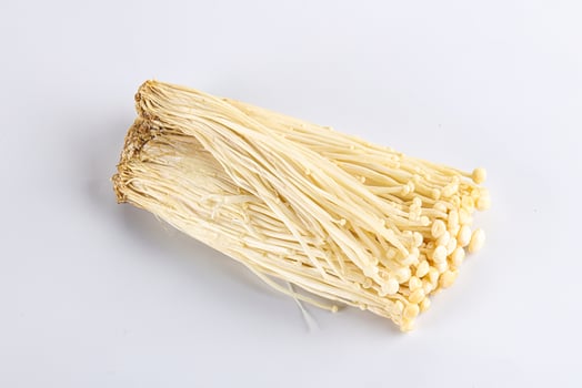 Tasty raw enoki mushroom heap photo