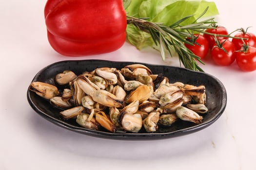 Marinated mussels in the bowl photo