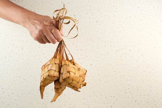 Ketupat or rice dumpling, a local delicacy popular during Eid al-Fitr. Indonesian traditional food photo